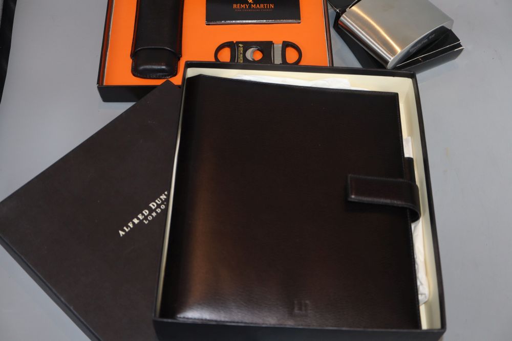 A Dunhill filofax, a Remy Martin cigar set and hip flask